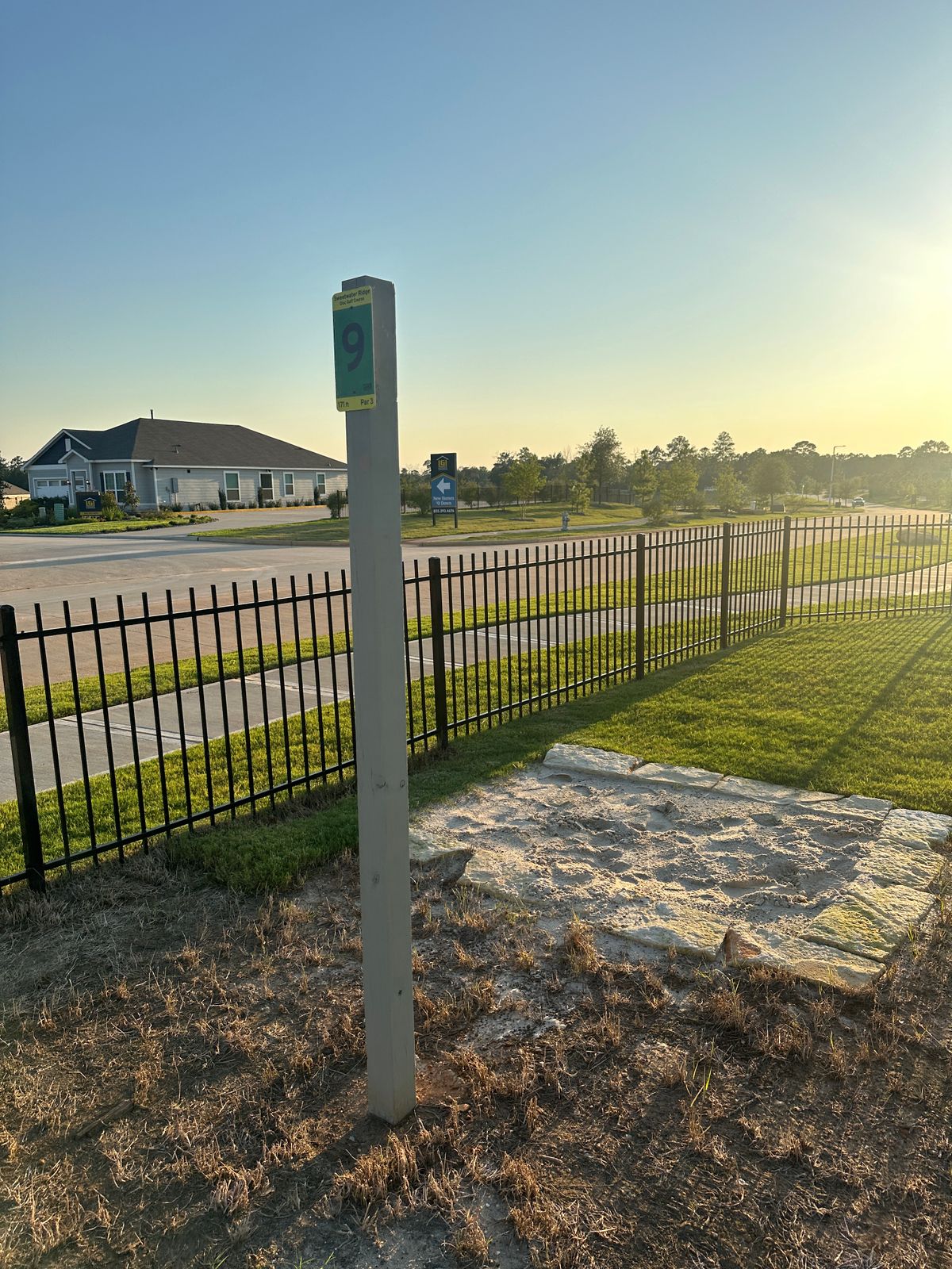 Hole 9 tee pad and sign