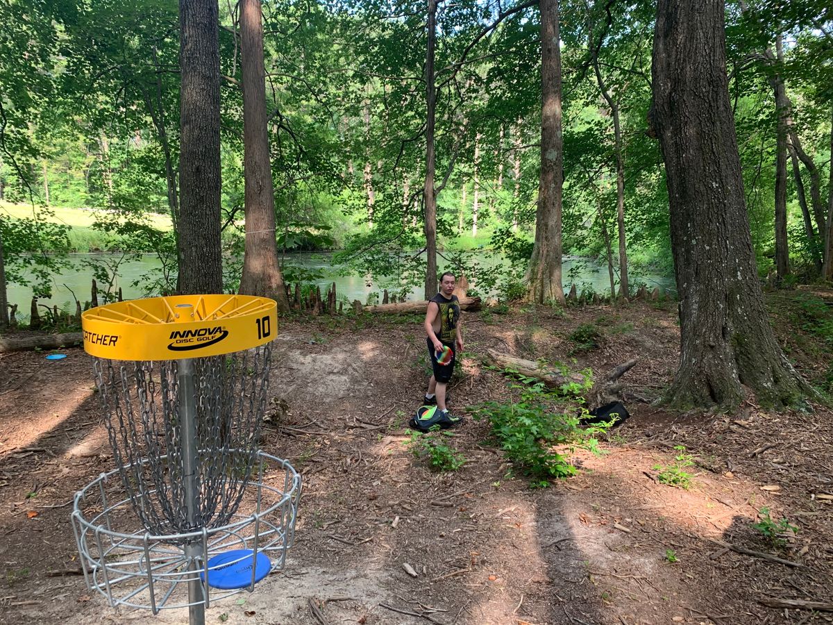 Careful not to go long or your disc will end up in the muck pond!