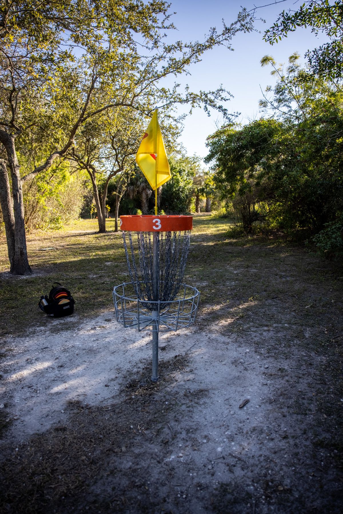 Hole 3 basket and fairway.
