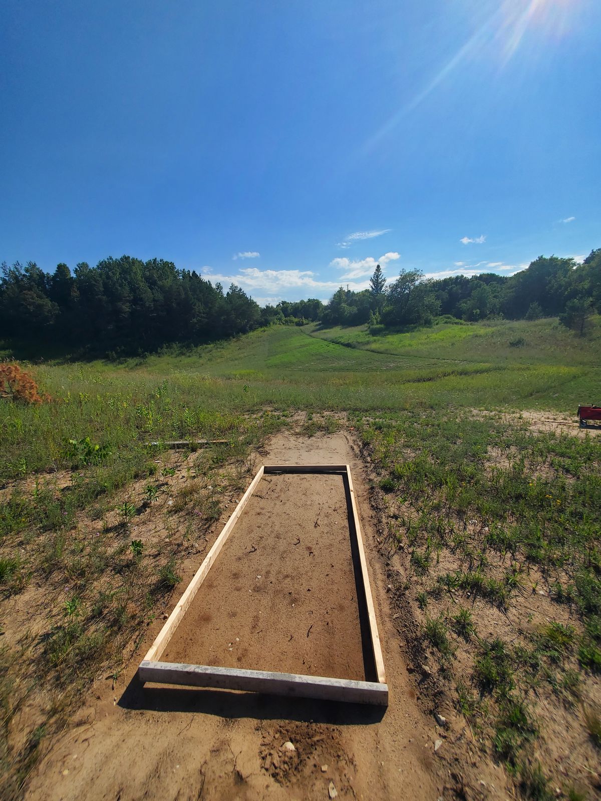 Hole 3 tee. 400ish uphill to the top.  Basket 150ish over top to right.