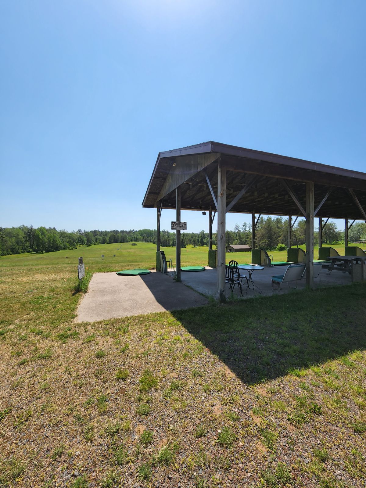 Nice Driving Range, shaded area, tables and chairs! Great course in Spring and Fall with less foliage. Summer brutal rough. Great Course!