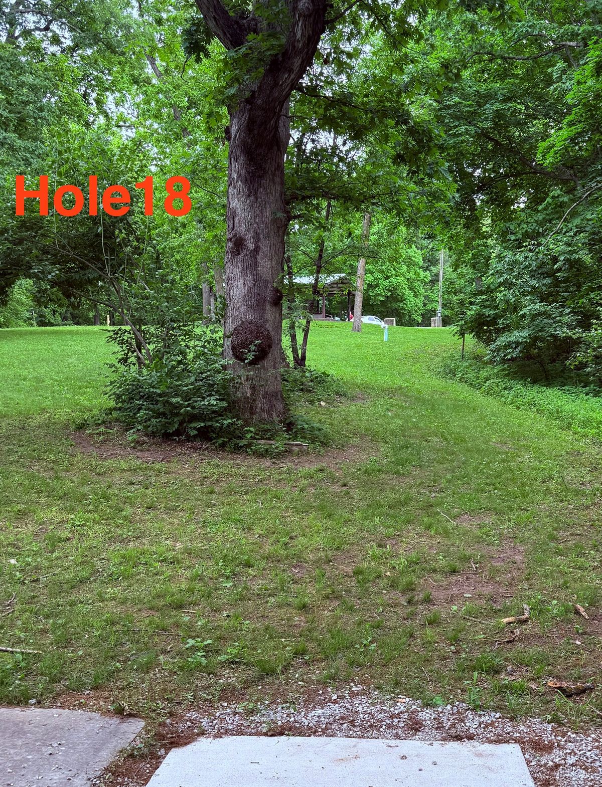 Hole 18
O.B. On concrete under shelter or into parking lot