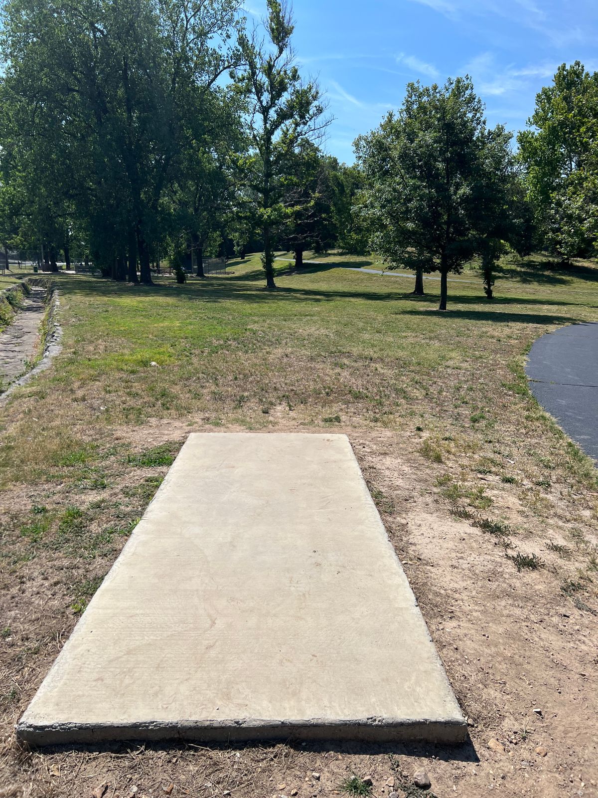 OB drainage ditch and beyond walk path on right