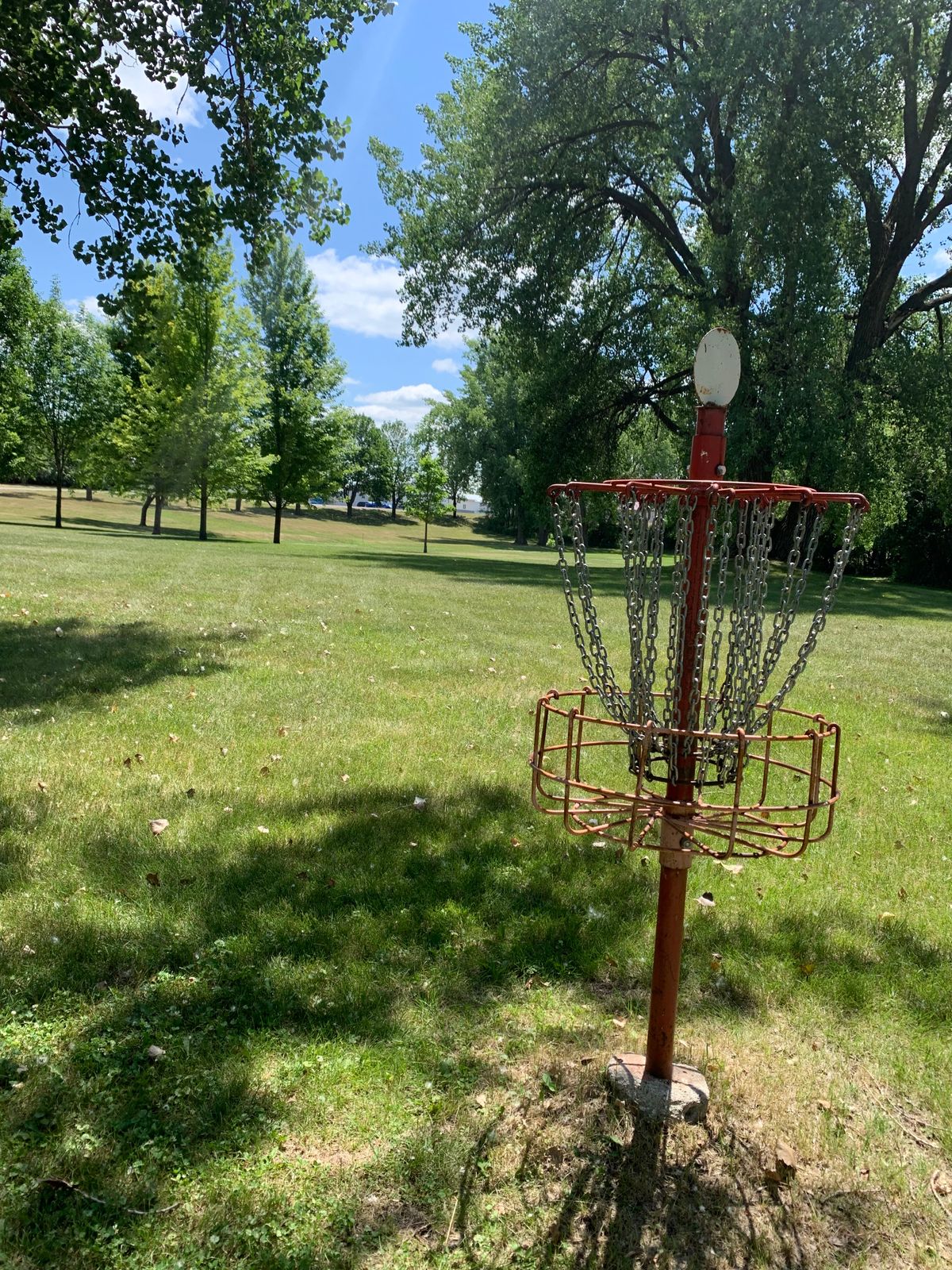 View of hole 12 basket looking back towards tee pad.