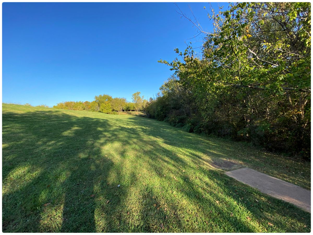 Wide open #10 - throwing west- lake at left top of hill