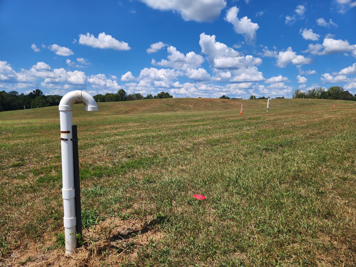 Course was built on a former landfill, methane vents I assume.