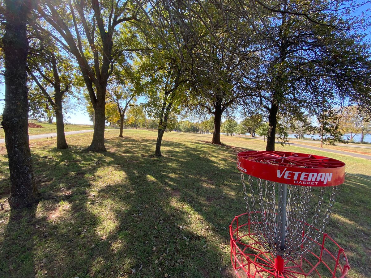 #14 green in that group of trees- tee is due west