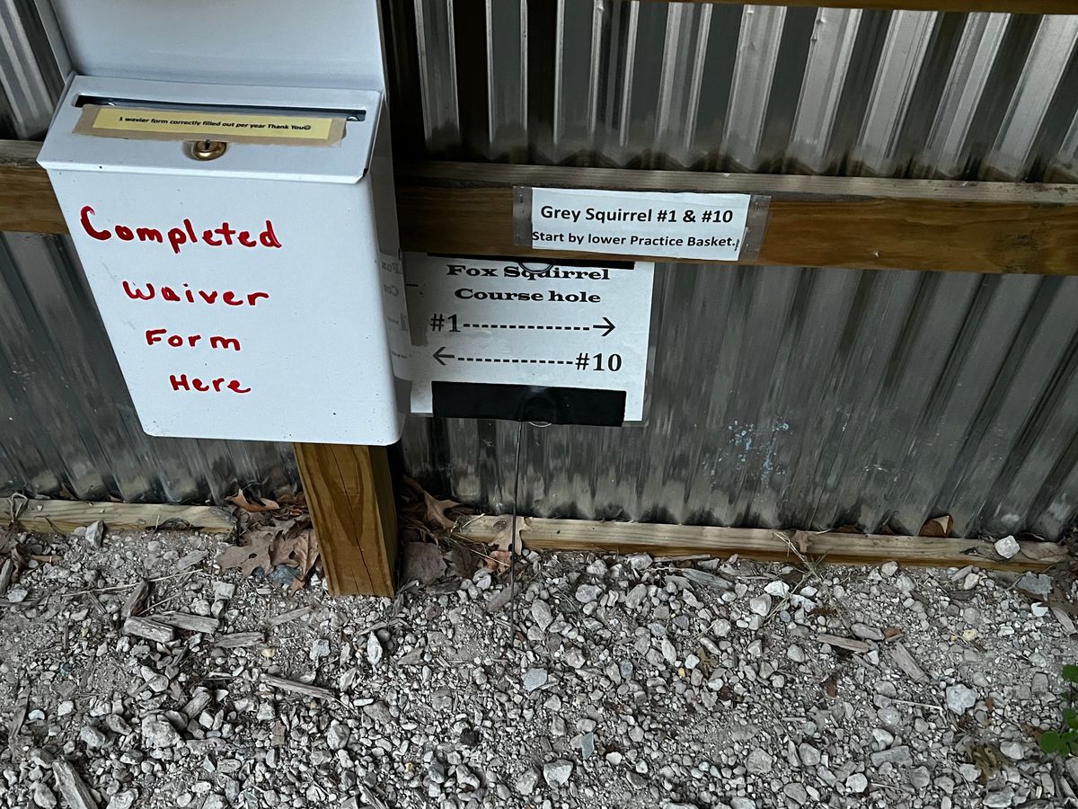 Start hole directional signs & waiver box.