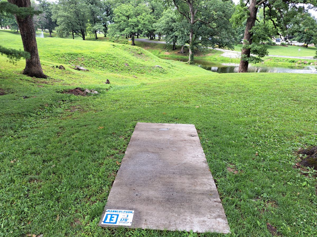 Hole 13. Very steep drop off. Throw just short into the hill.