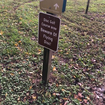 At the far trail entrance onto course