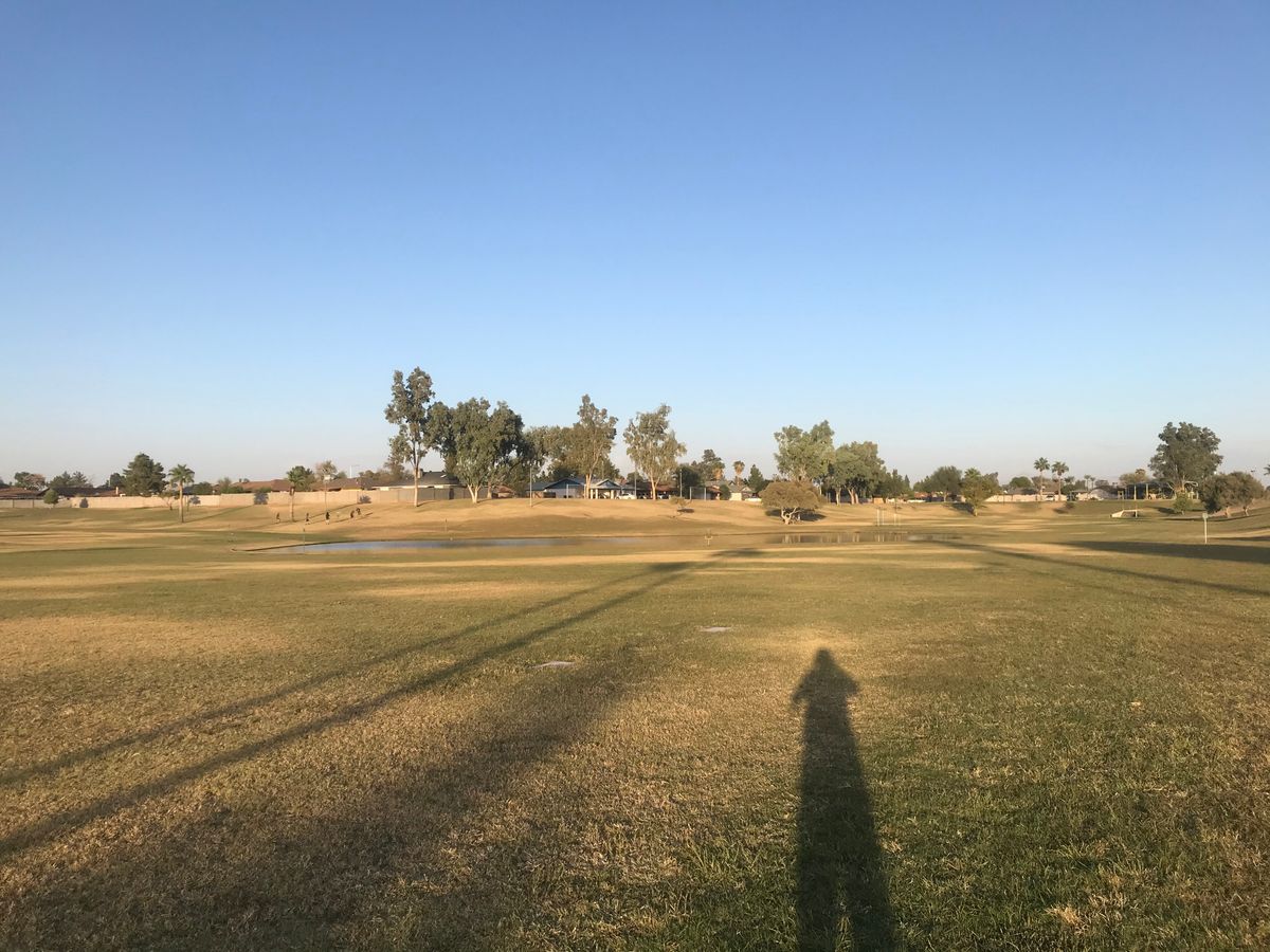 Middle of the course where pond is.
