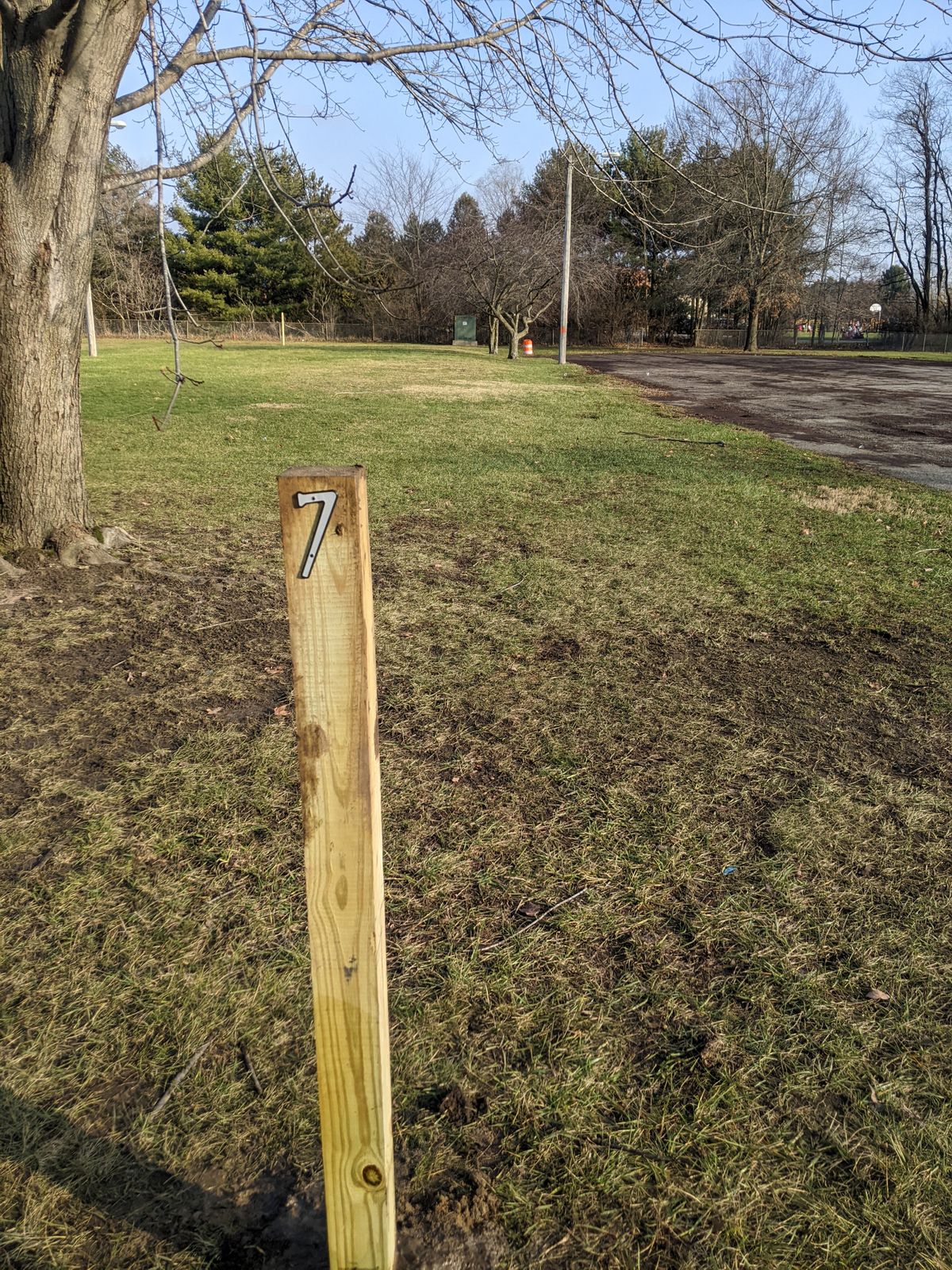 Tee Pad 07 mandatory to left of the telephone pole along the parking lot.