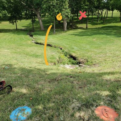 Hole 6 - 278'  Basket is hidden behind trees