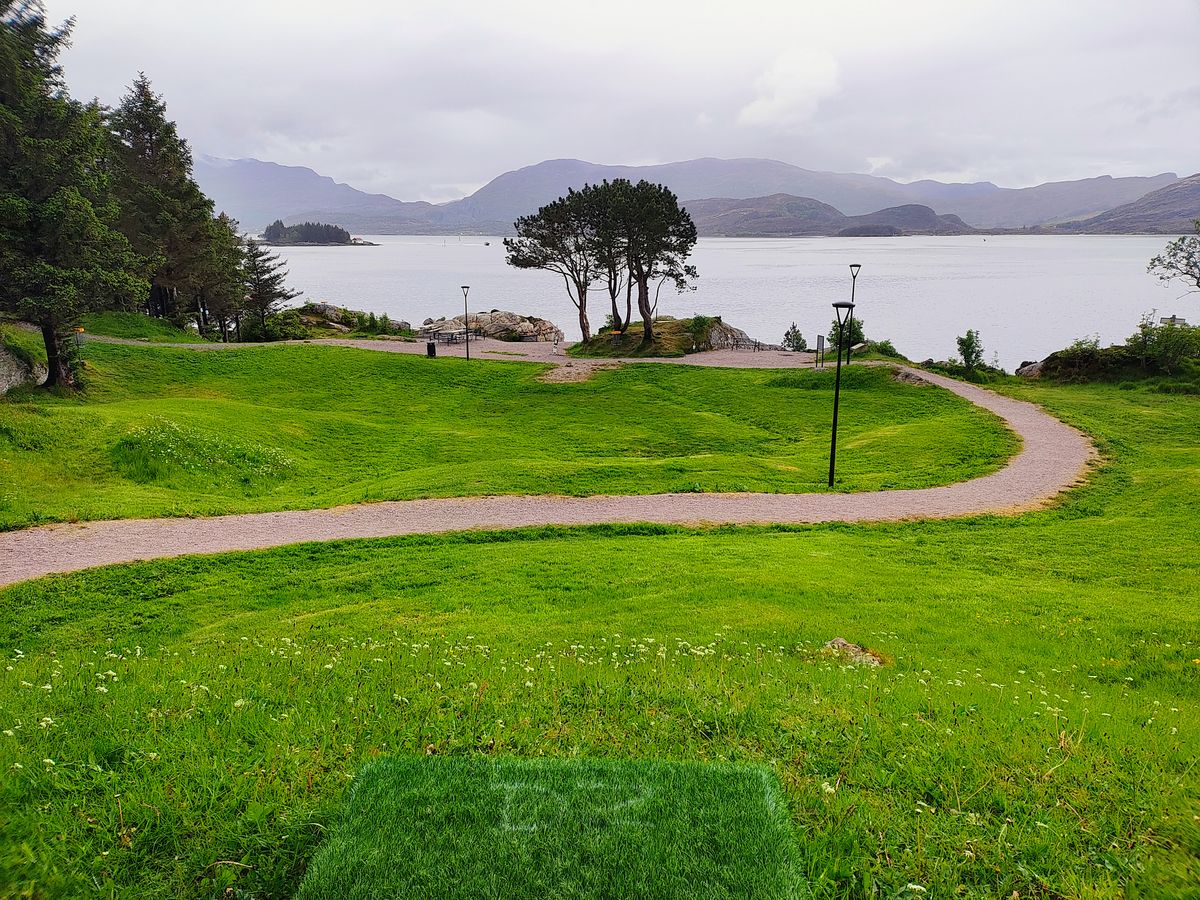Tee 3, basket near water on left