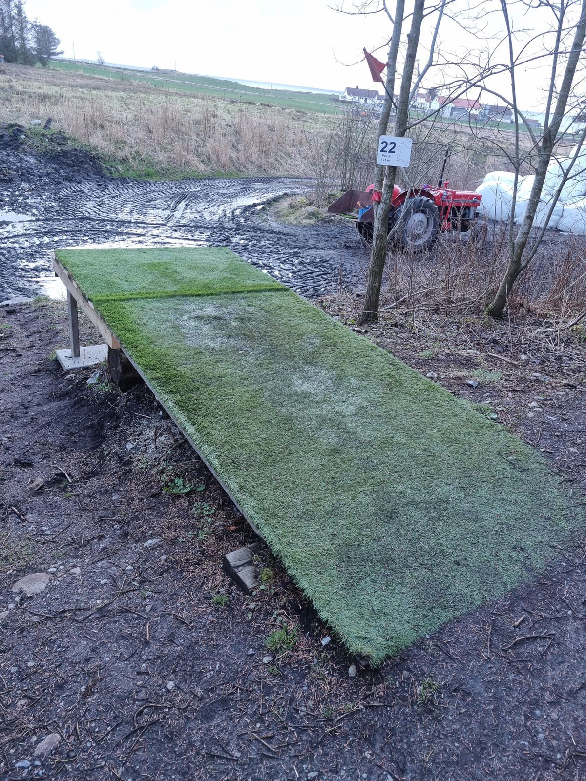 Forlenget tee pad