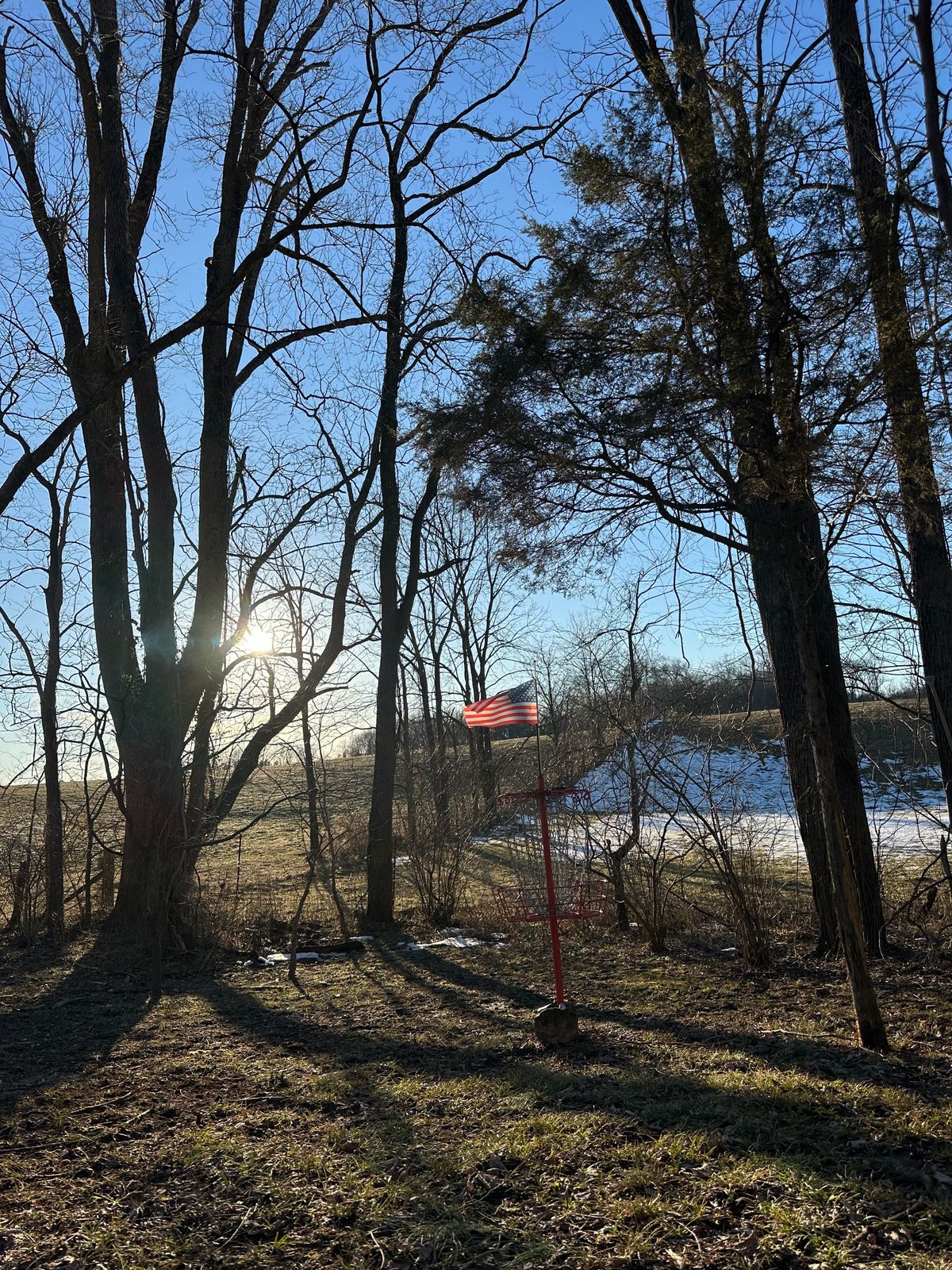 Hole 2 basket. Over fence is OB