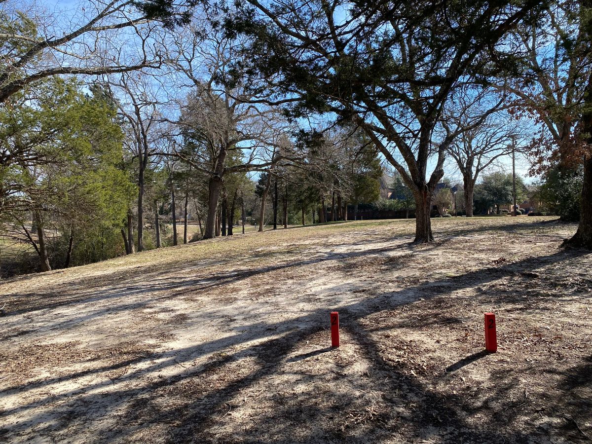 Hole 2 - 225ft. Down the hill in the bowl. Same rules for creek and beyond being OB.