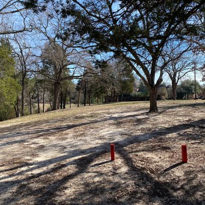 Hole 2 - 225ft. Down the hill in the bowl. Same rules for creek and beyond being OB.