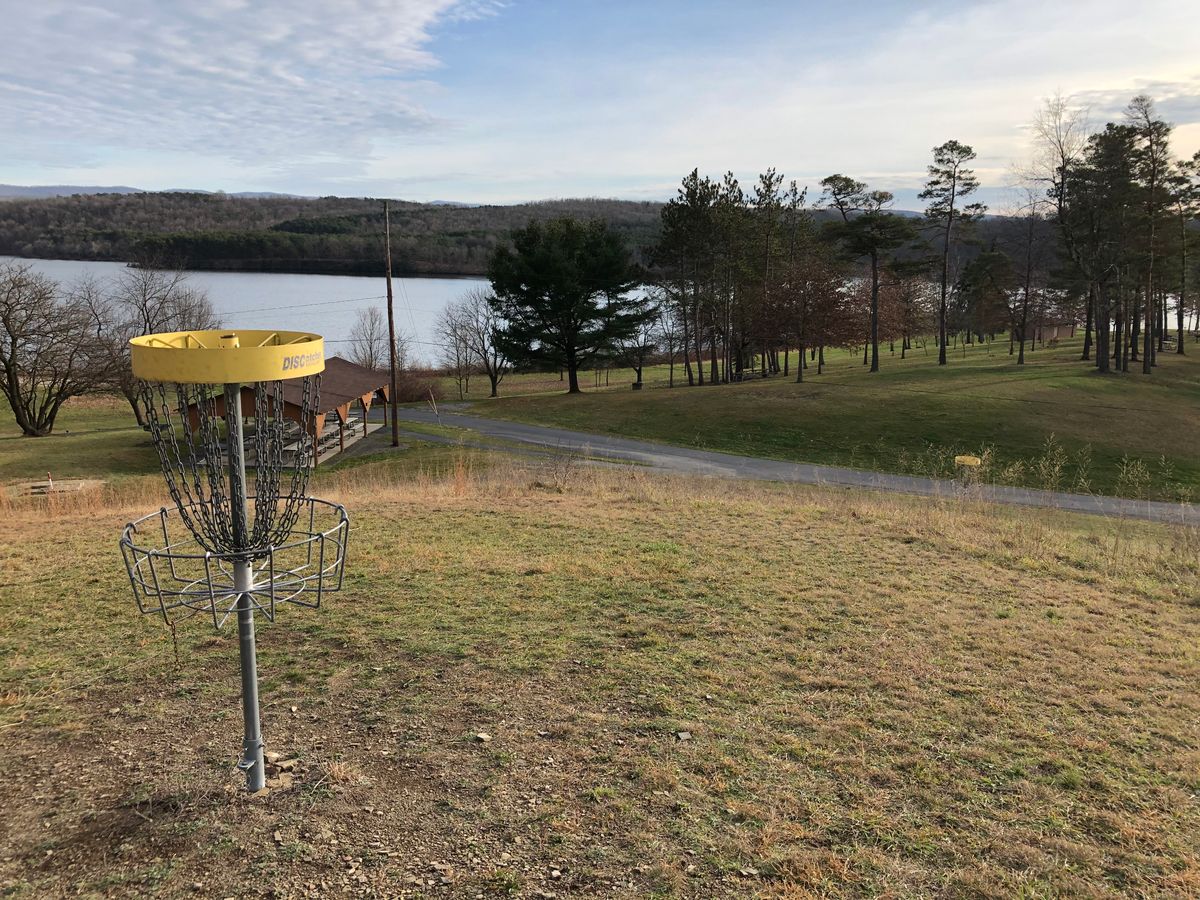 Hole 6 basket with hole 8 in the distance.