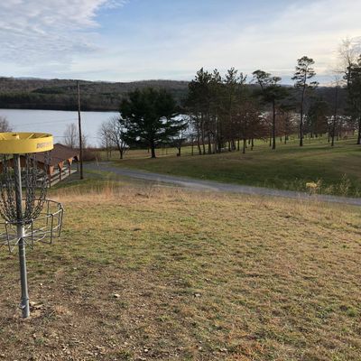 Hole 6 basket with hole 8 in the distance.