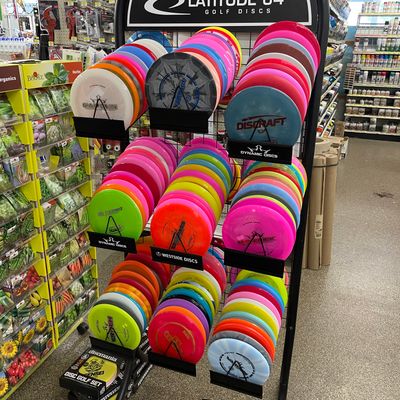 One double sided rack with trilogy, Innova, discmania, and Discraft   Saw a couple mvp discs as well