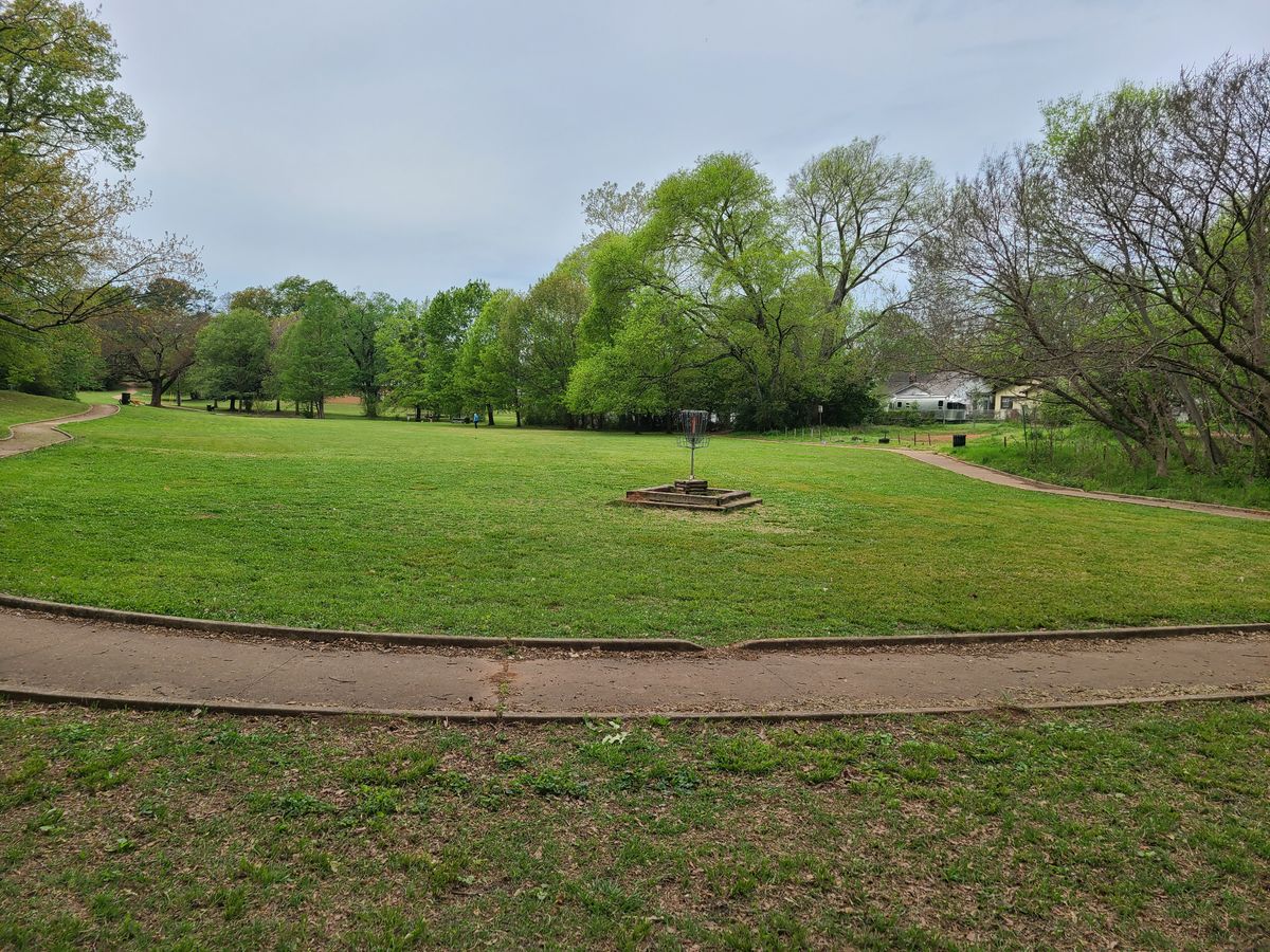 One of the baskets for hole 5, looking back towards the tee