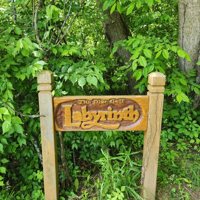 Cute wooden sign for the putt skills course - the Labyrinth