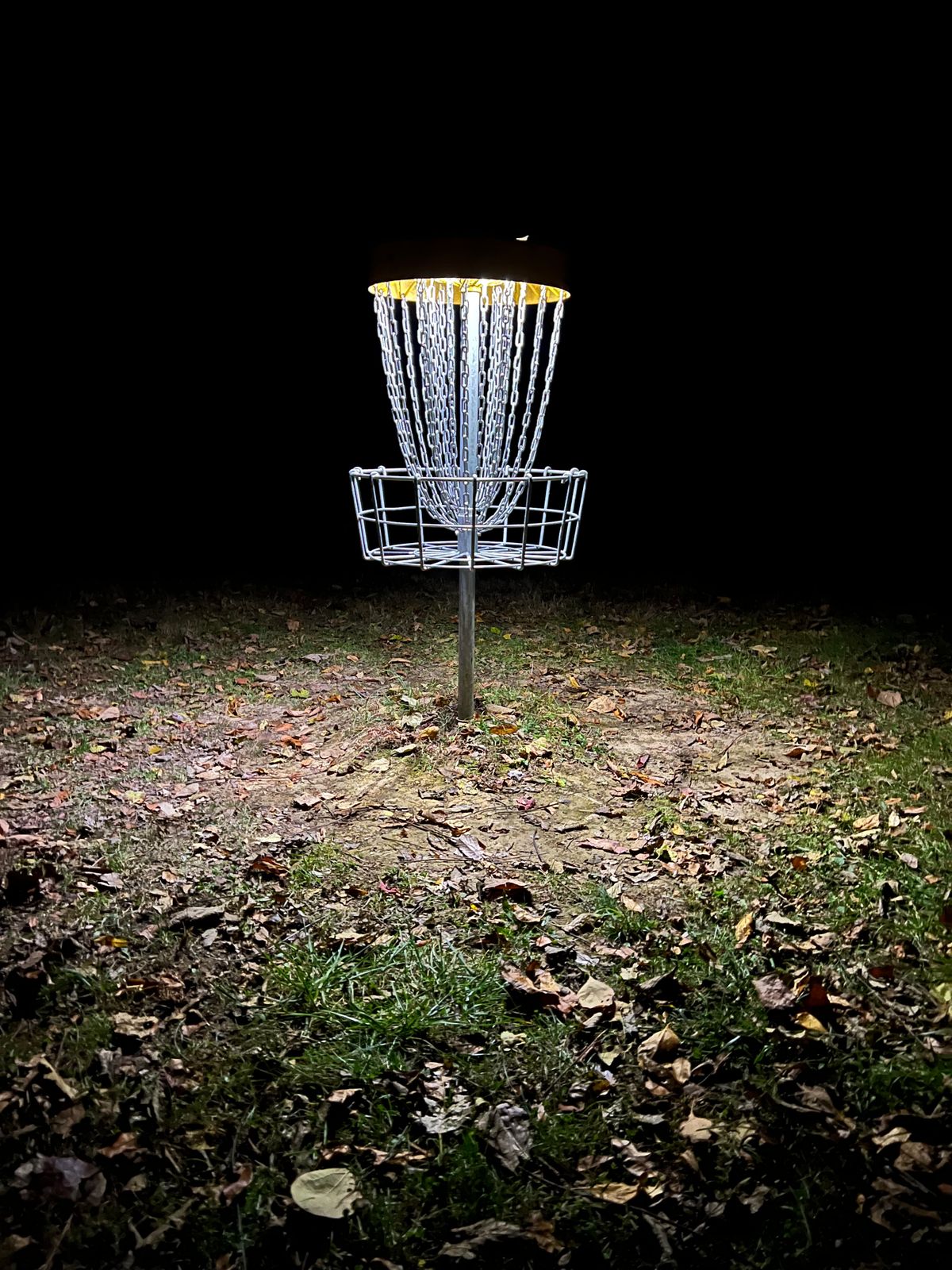 Photo of Hole 18’s basket during the Eastern Panhandle Disc Golf Clubs 2024 Glow Season! 🍂👻🌒