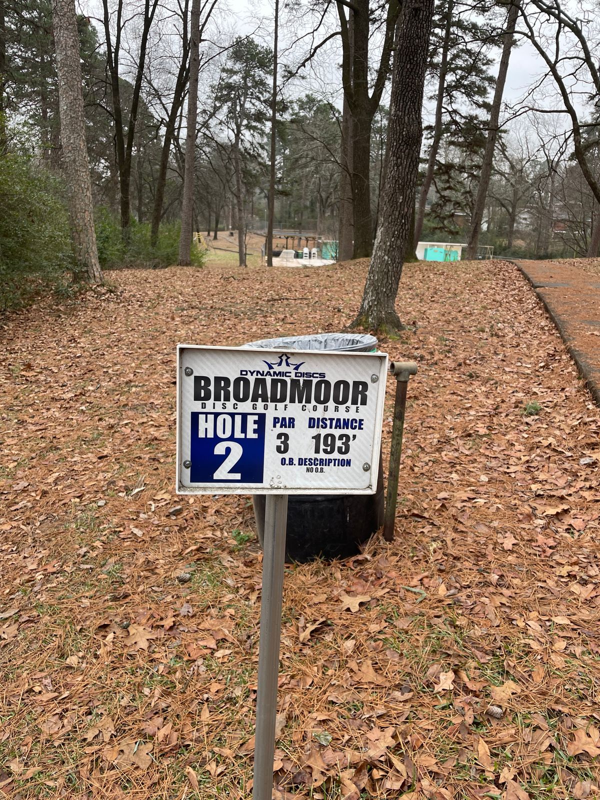 Hole2: Over the ridge line and down to the left behind distant brush.