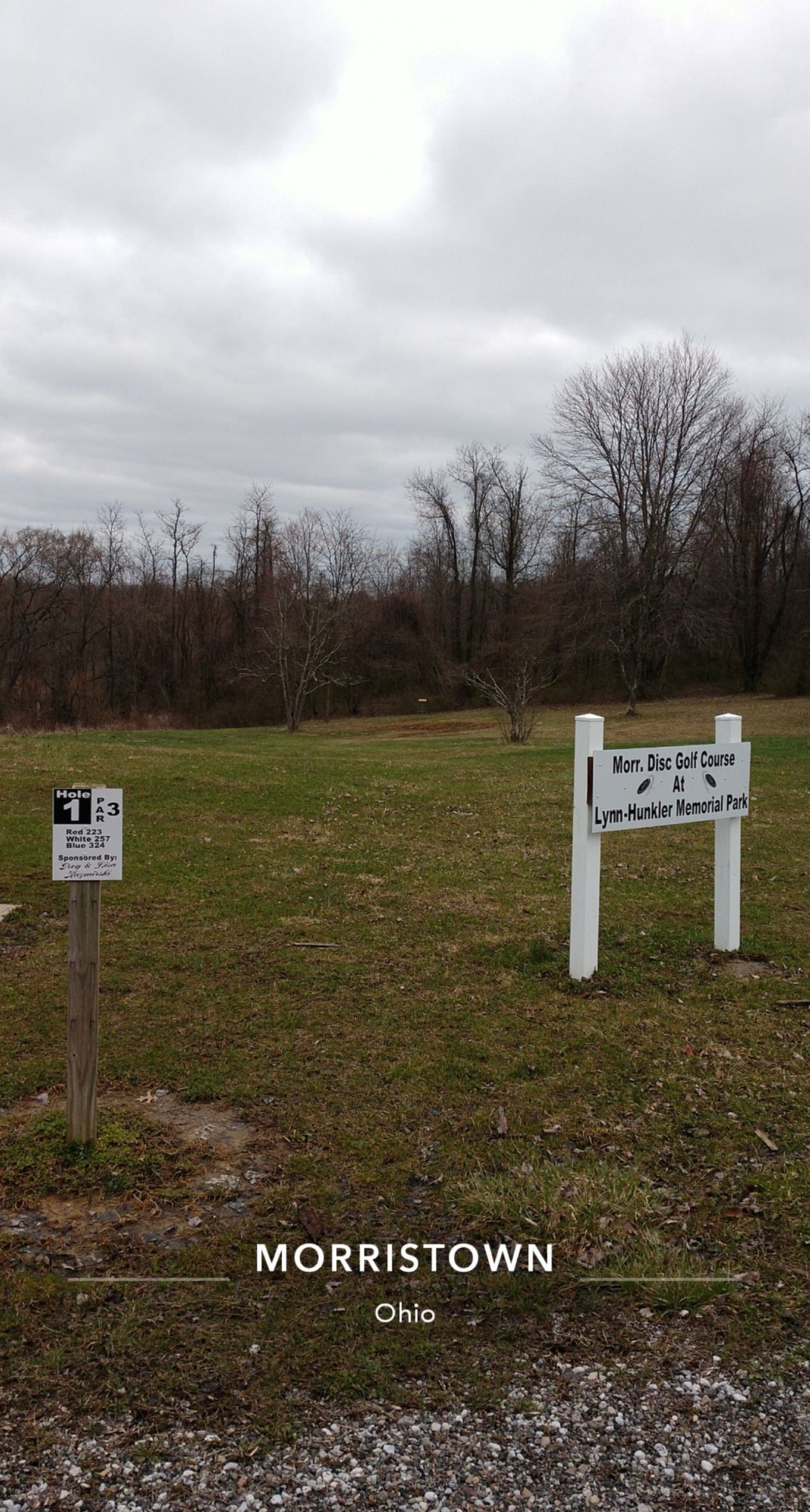 Hole 1 tee pad and course sign