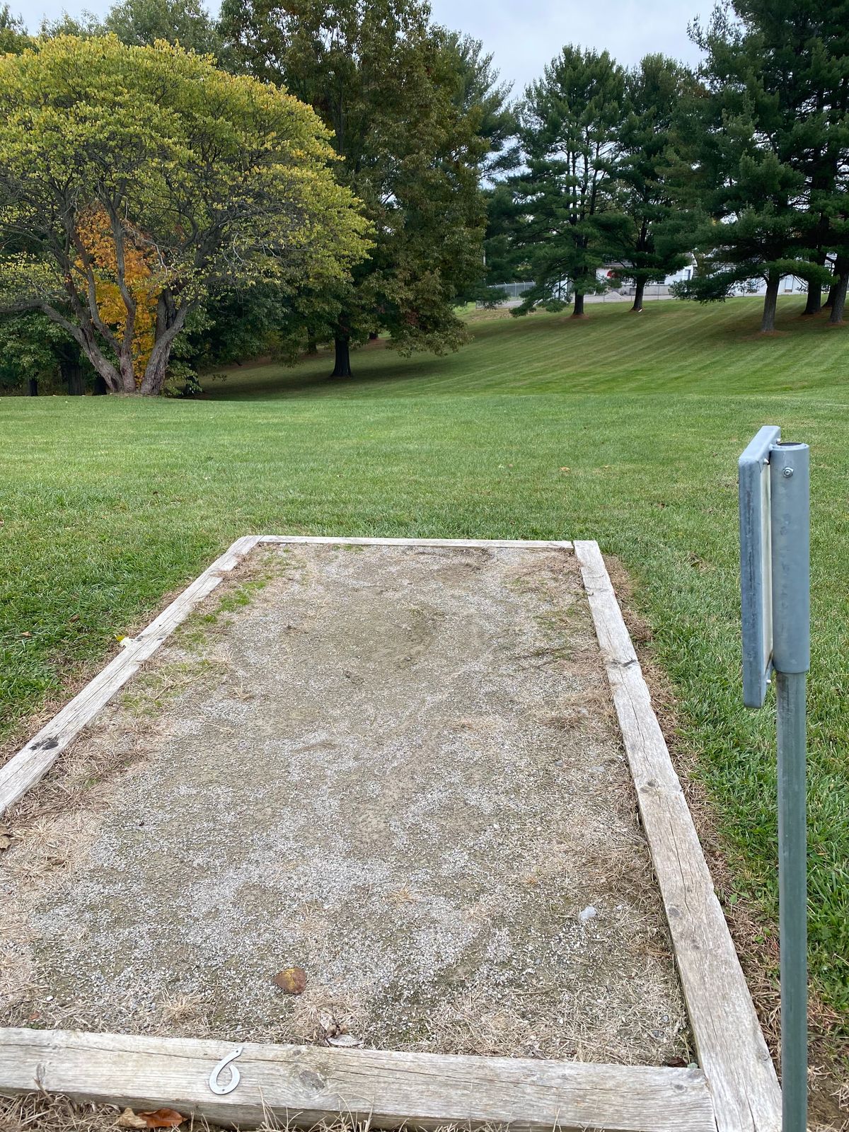 The down hill line, basket hidden to the left, of hole 6