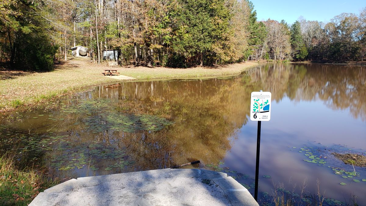 across the water and stay left of the tank.