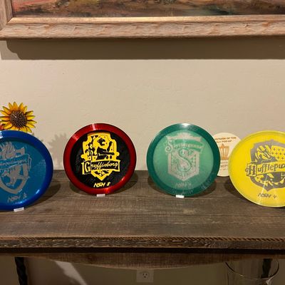 The wizarding set: Ravendwayne, Gryffinborg, Slythergunnz, and Huffleputt.