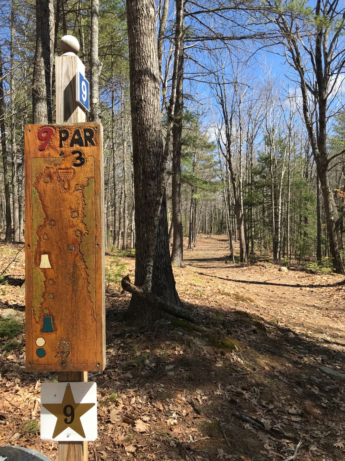 Rustic hand-carved signs w/ star layout indicators