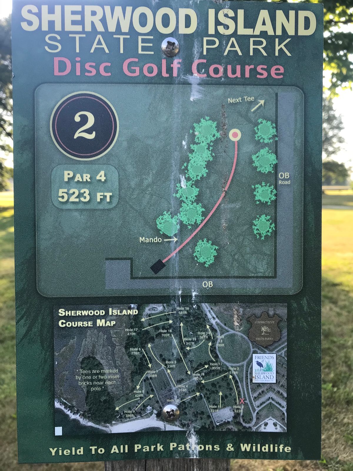 This tee and map have been removed; consider using the flagged tee 75 ft closer to basket. Little overview map shows old layout (was inaccurate on holes 1 and 2).