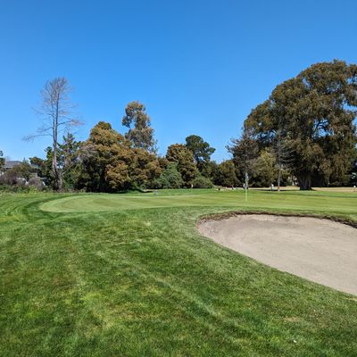 Greens are ob, sand traps are hazard. Many baskets are placed near one or both.