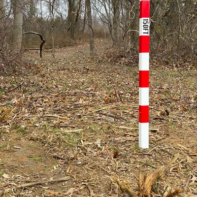 Distance markers at 150 feet from the basket on the longer holes.