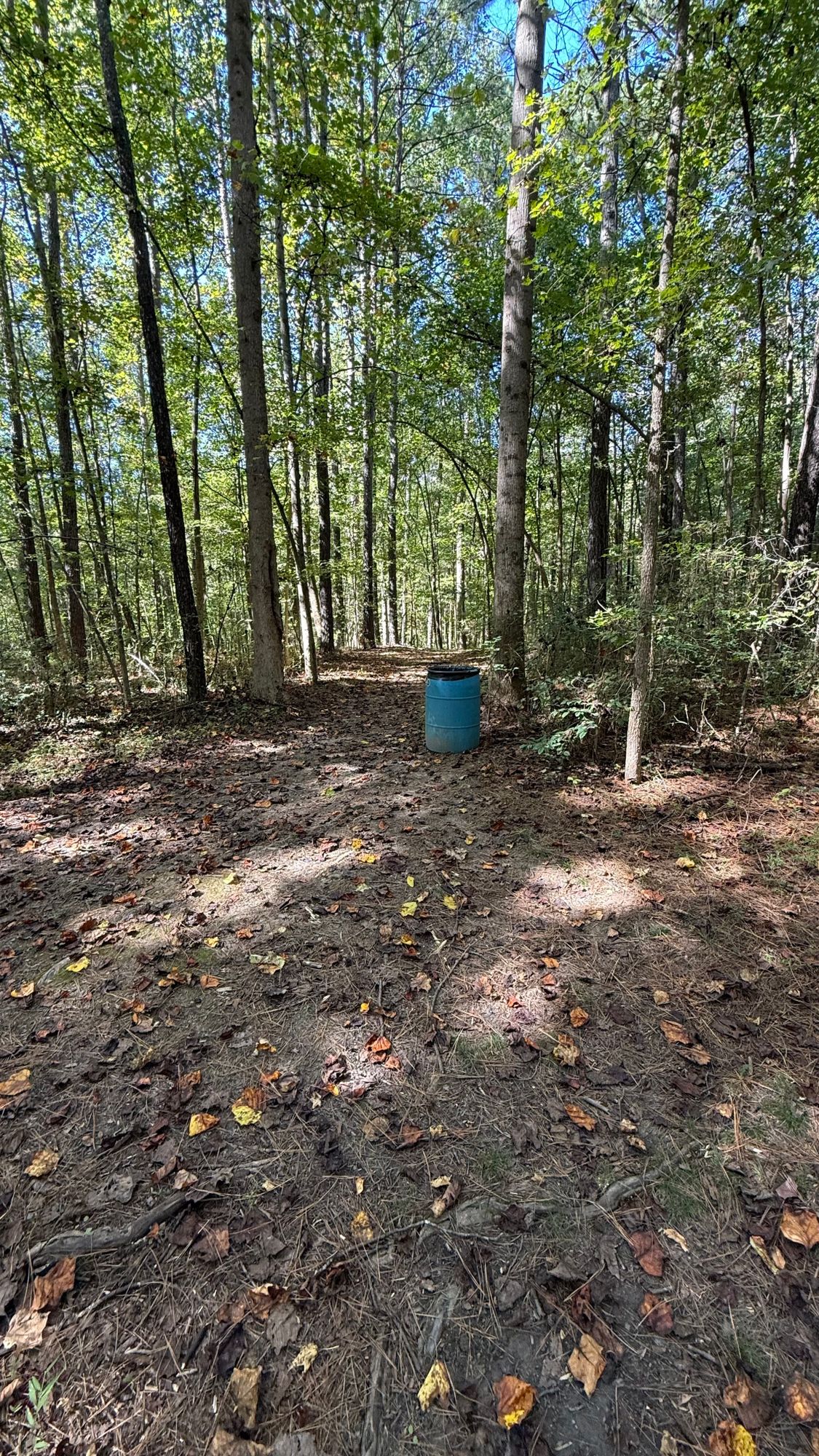 I suggest leaving your bag/gear here & finishing 13.  This path will lead you to hole 14