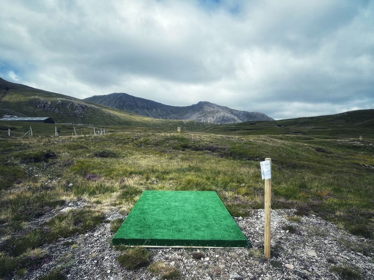 Practice hole on the path up from the ski lift; hole 1 starts further up the road, near the cafe