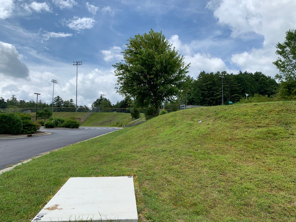 2- top right by baseball fence and next to restrooms, watch out for people and parked cars