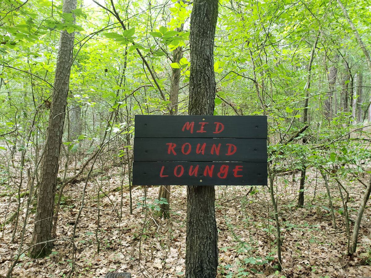 Mid Round Lounge Sign