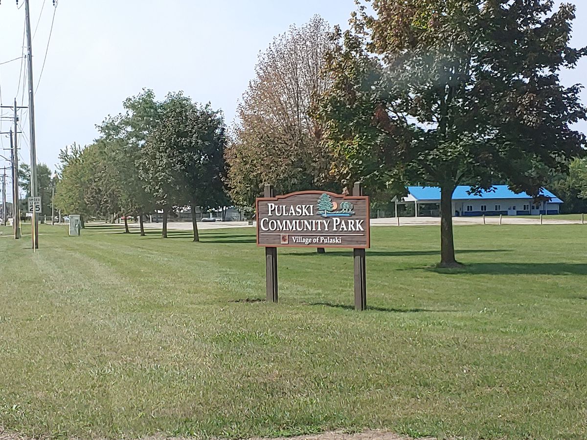 where u enter the course at. Straight ahead first left. Park in gravel lot.