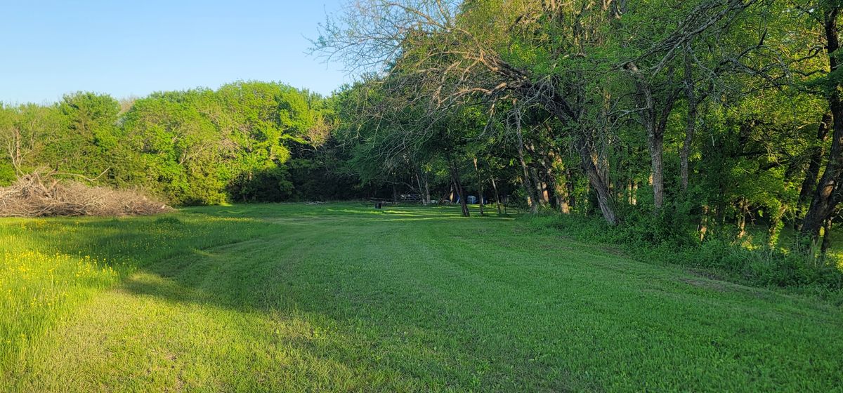 hole 3 fairway and green (in the small trees just right of center).