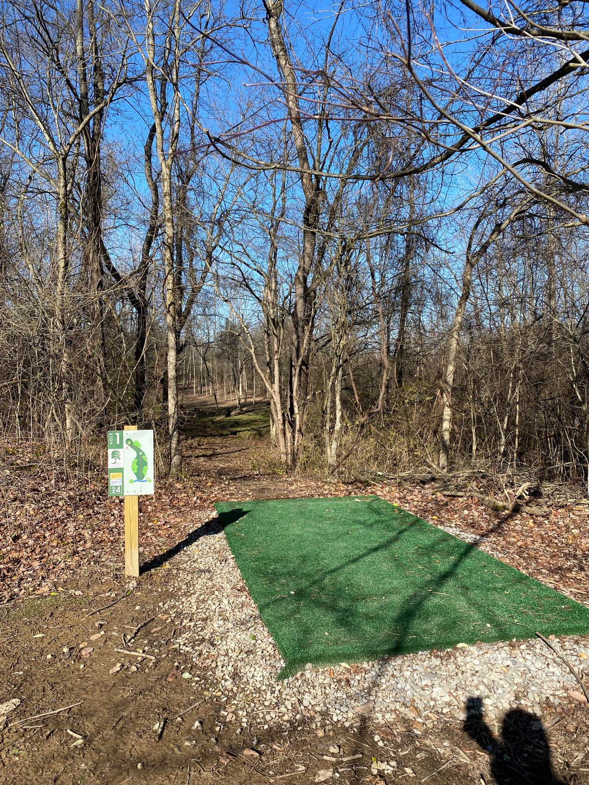 Easy to read signs, turf pads, and a narrow line welcomes you to the course