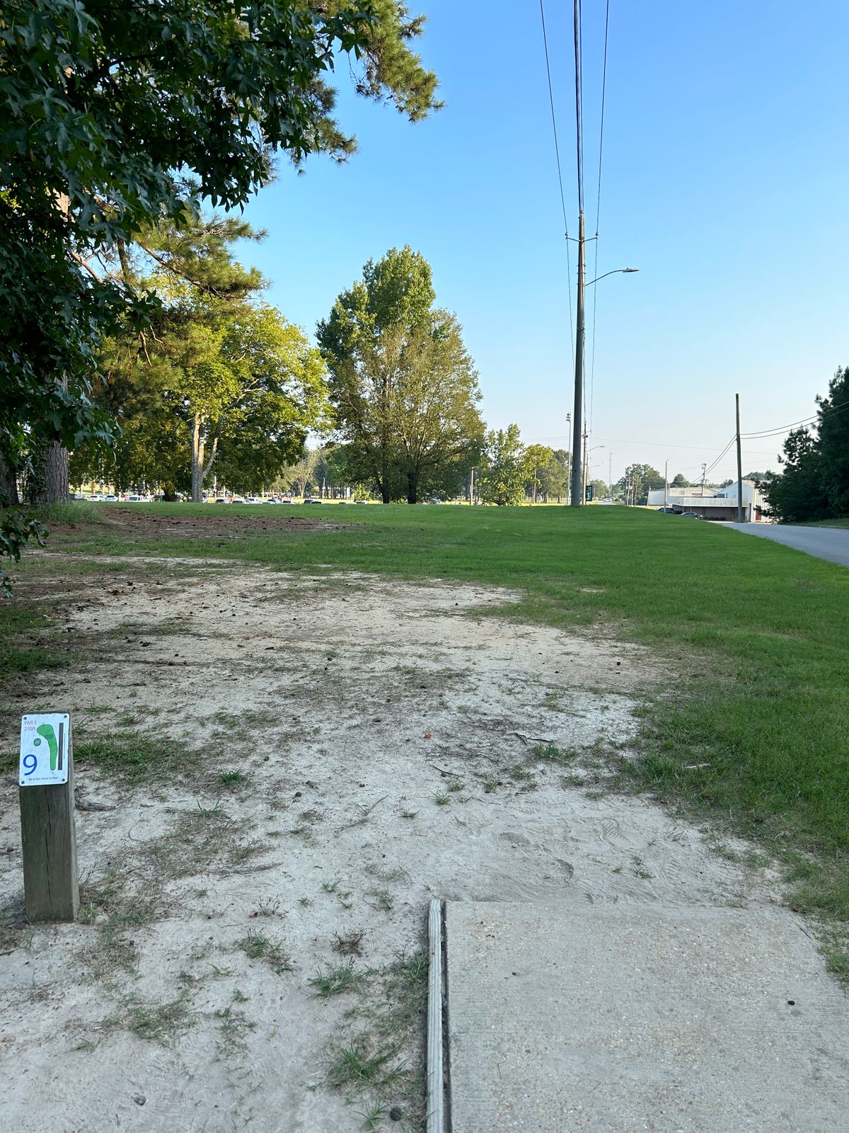Hole 9 is straight ahead over the hill and behind rightmost 2 trees
