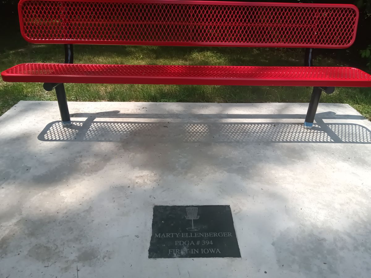 Memorial Bench for founder of original Disc Golfer who installed object course in 1979