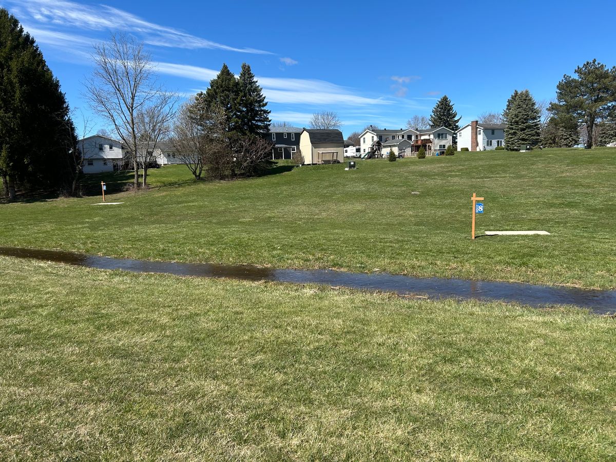 Flooded creek bed, made the course more risky and fun. Yes your disc will float away fast!