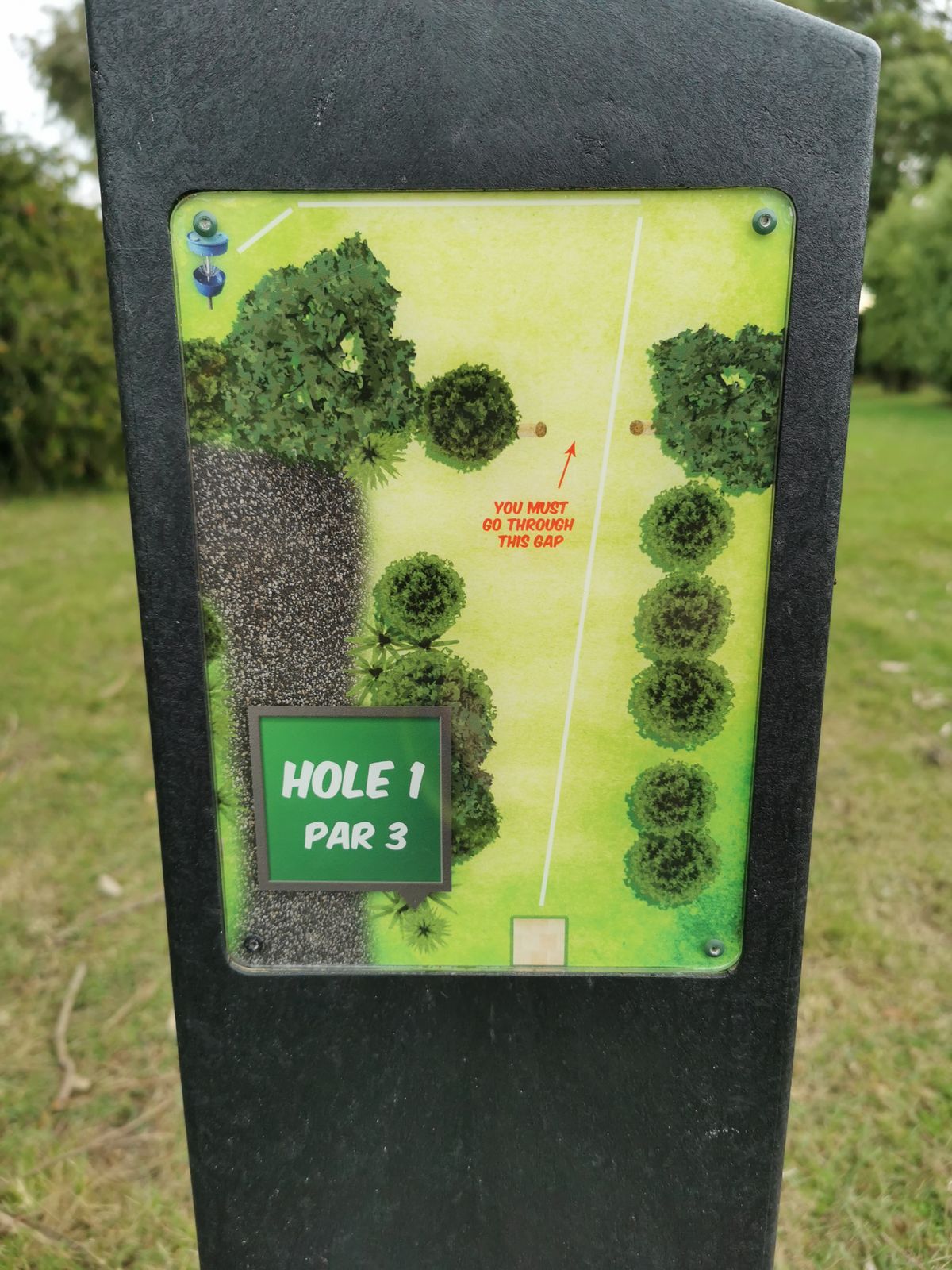 Double Mando between trees, listed as Par 3 but should be a Par 4.