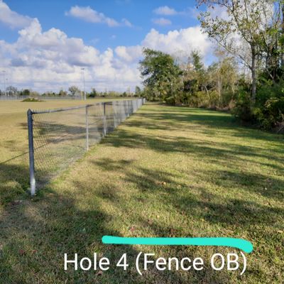 North of fence is OB.  Drop zone under large oak halfway up the lane.