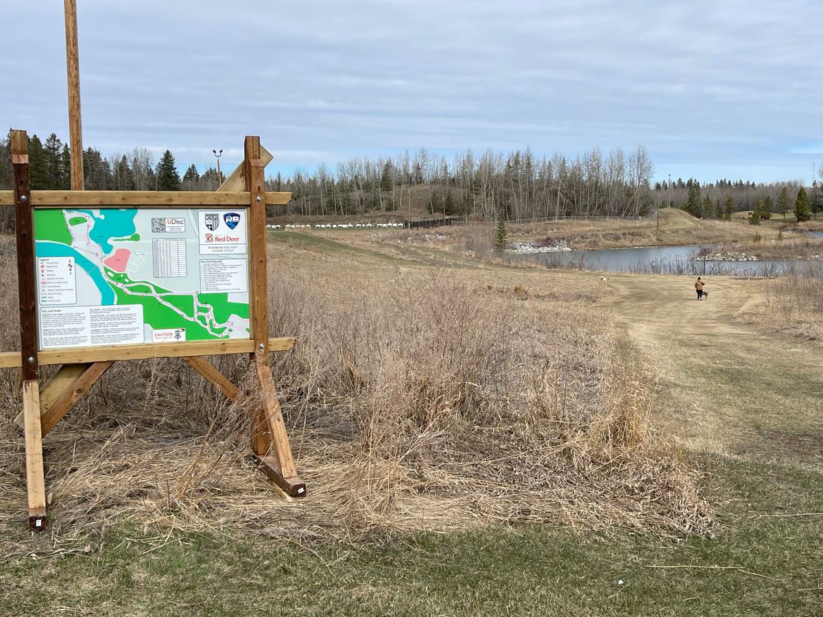 Hole 1 with the layout map and hole 2 in the distance